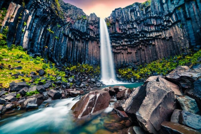 Svartifoss waterfall in Iceland contrasts nicely with its surroundings. Perfect for Instagram!