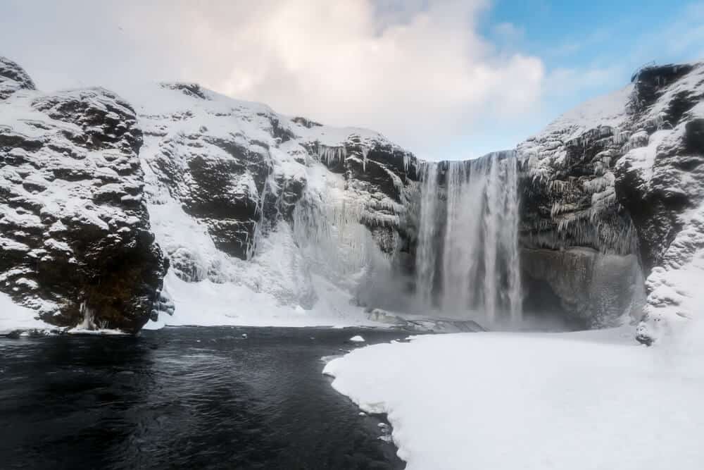 Frozen Skogafoss Waterfall During Winter In Iceland