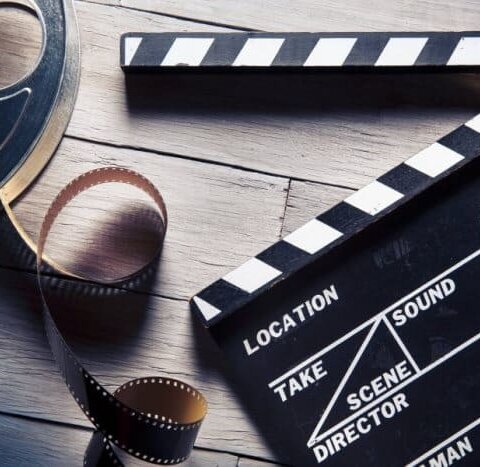 film reel and movie clapper used in films sets