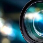 Camera lens looking for famous people