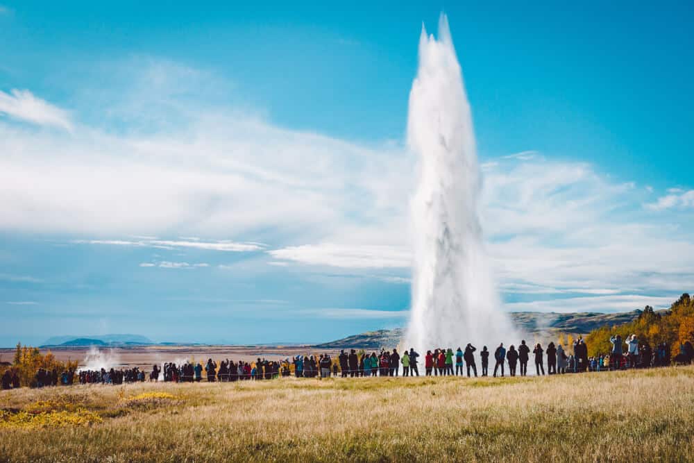 Geysir With A Group Of Visitors,Once Of Iceland'S Main Tourist Destination