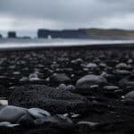 Black volcanic rock in a black sand beach in Iceland