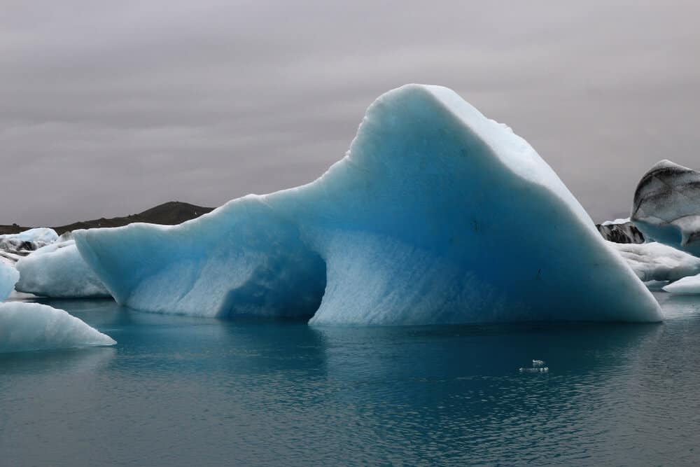 An small iceberg floating in the Jókulsárlón glacier lagoon, one of the top five things to do in Iceland