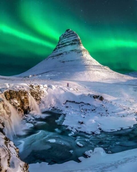 The Northern Lights in Iceland over Kirkjufell mountain