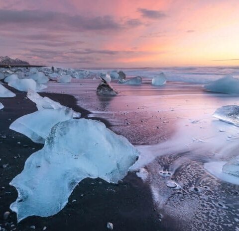 Jökulsárlón Glacier Lagoon at dawn with a beautiful purple light