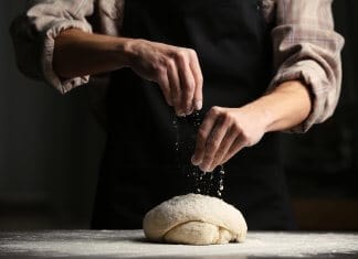Baker preparing bread in one of Reykjavik's best bakeries