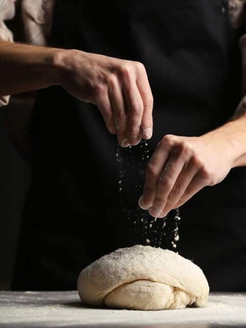 Baker preparing bread in one of Reykjavik's best bakeries