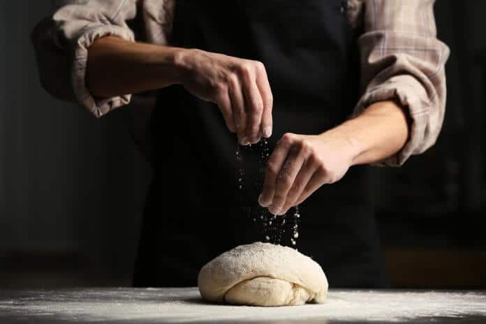 Baker preparing bread in one of Reykjavik's best bakeries