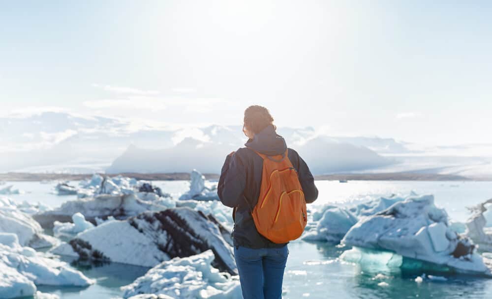 Girl with a light backpack, it is a must in our Packing Guide For Reykjavik