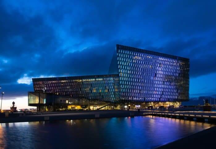 Harpa Concert Hall lit up at night during 24 hours in Reykjavik