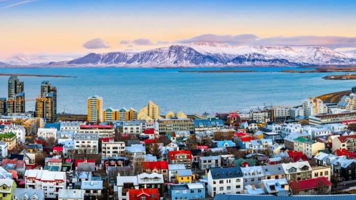 Reykjavik with water and mountains in the distance during 24-hour stopover