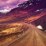 Iceland's Ring Road main stops with mountains in the background