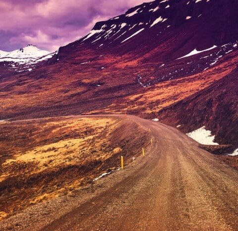 Iceland's Ring Road main stops with mountains in the background