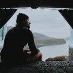 Man looking out from his Iceland campervan rental