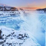 Winter travel tip with frozen Gullfoss waterfall