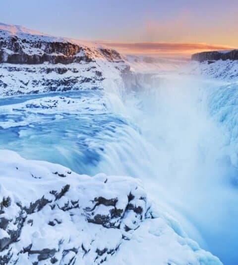 Winter travel tip with frozen Gullfoss waterfall