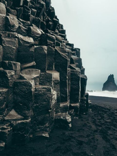 Reynisfjara black sand beaches and basalt columns are Vik's signature natural attraction