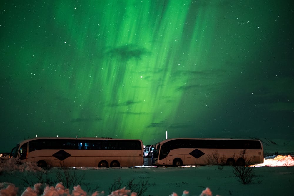 Icelandic Bus System Under The Northern Lights